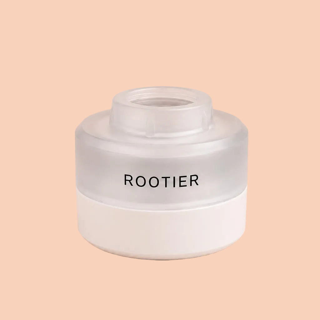 Rootier Tap Filter in White, mounted on a kitchen faucet